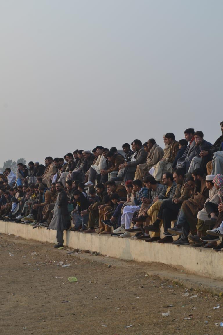 Spectators watching the match